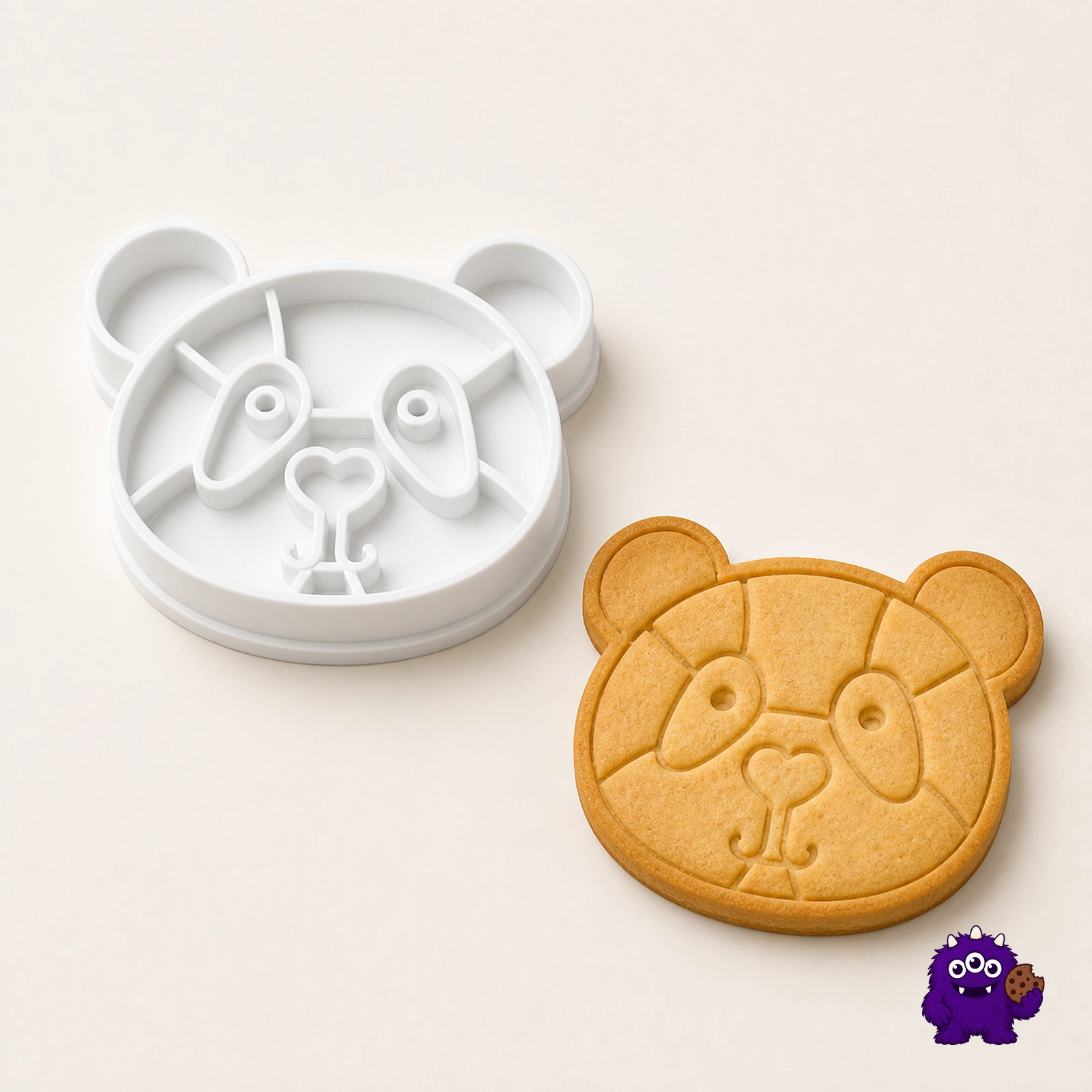 Panda cookie cutter with a matching detailed biscuit