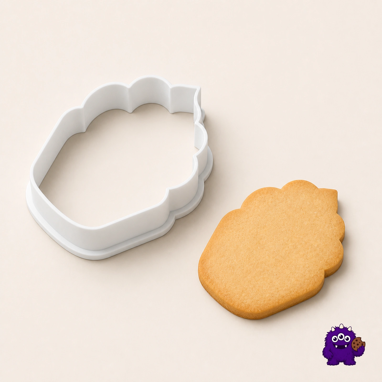 Rounded cupcake outline cutter with a matching biscuit