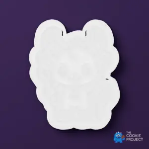 Krampus Cookie Cutter - white cutter viewed directly from above on dark purple
