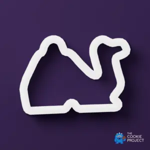 Nativity Camel Design 2 Cookie Cutter - white cutter viewed directly from above on dark purple