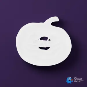 Halloween Jack-o'-Lantern Cookie Cutter - white cutter viewed directly from above on dark purple