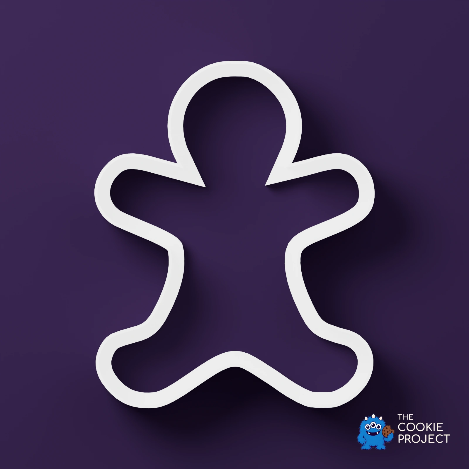 Christmas Cookie Cutter Set of 7 - white cutter viewed directly from above on dark purple
