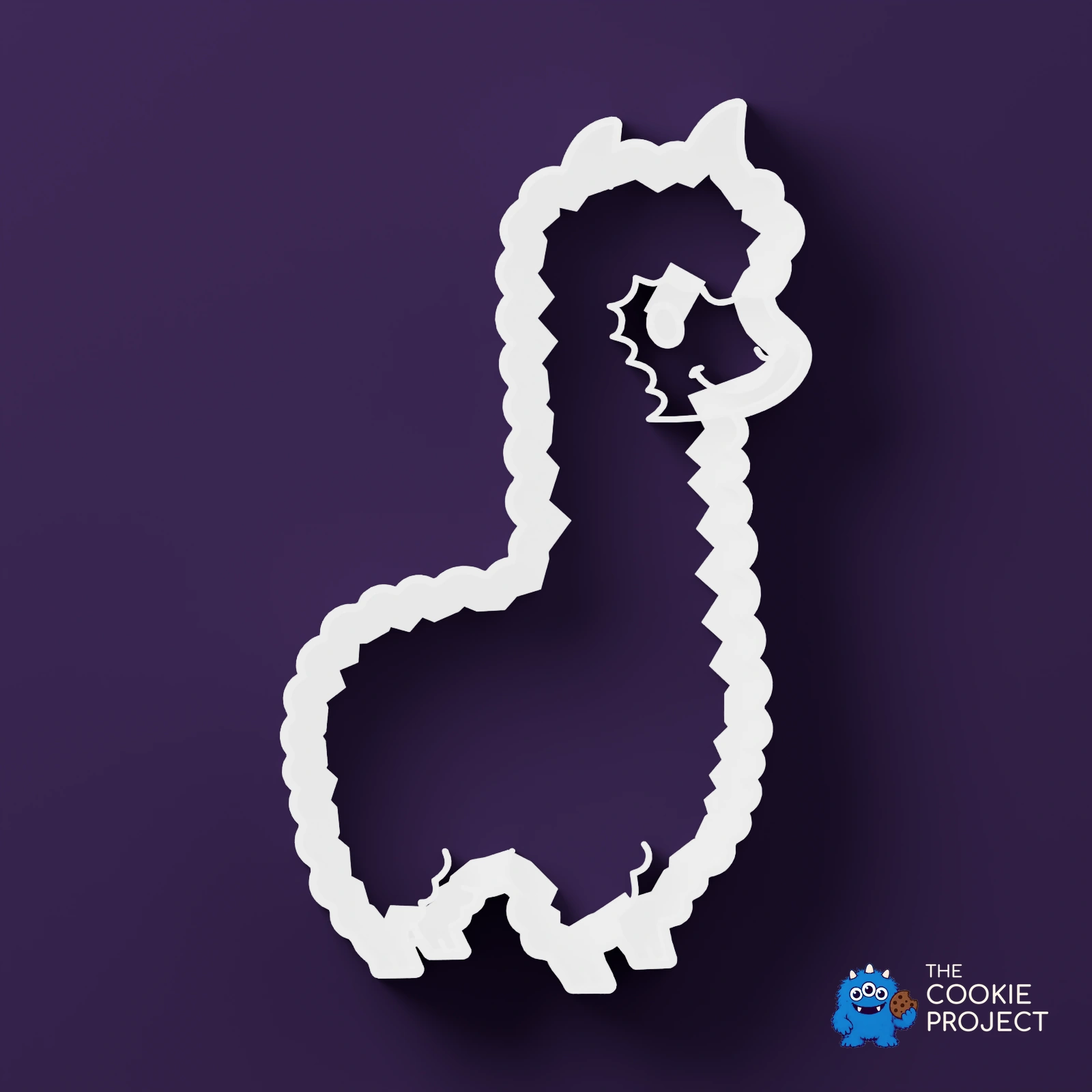 Alpaca and Llama Cookie Cutter Set of 2 - white cutter viewed directly from above on dark purple