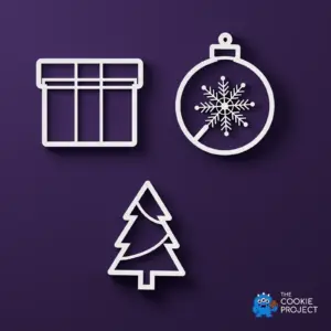 Three white Christmas gift cookie cutters shown directly above on dark purple: gift box, ornament and tree