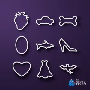 Mixed Cookie Cutter Collection of 9 - white complete set viewed directly from above on dark purple