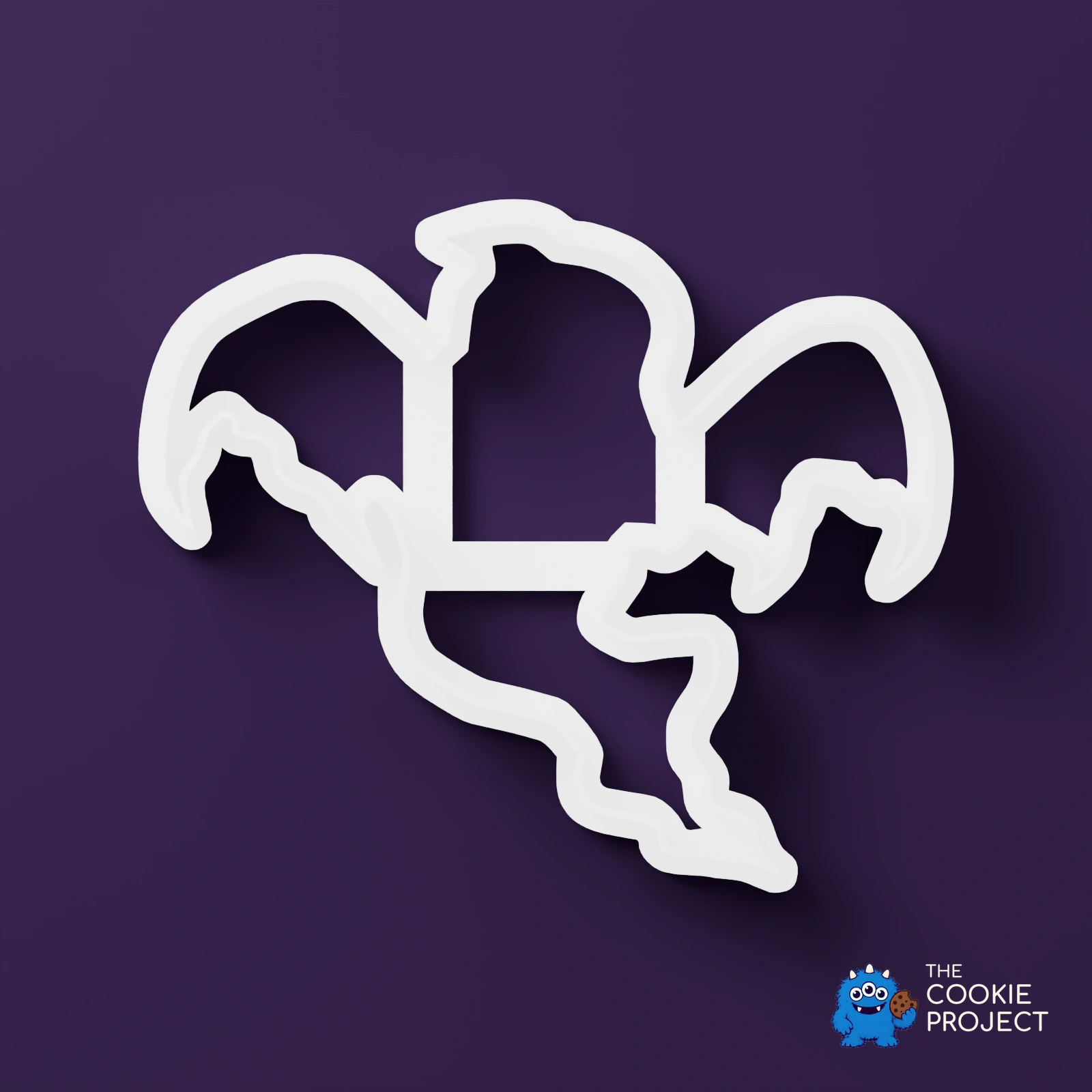Halloween Ghost Cookie Cutter – Design 2 - bright white included component viewed directly from above on dark purple
